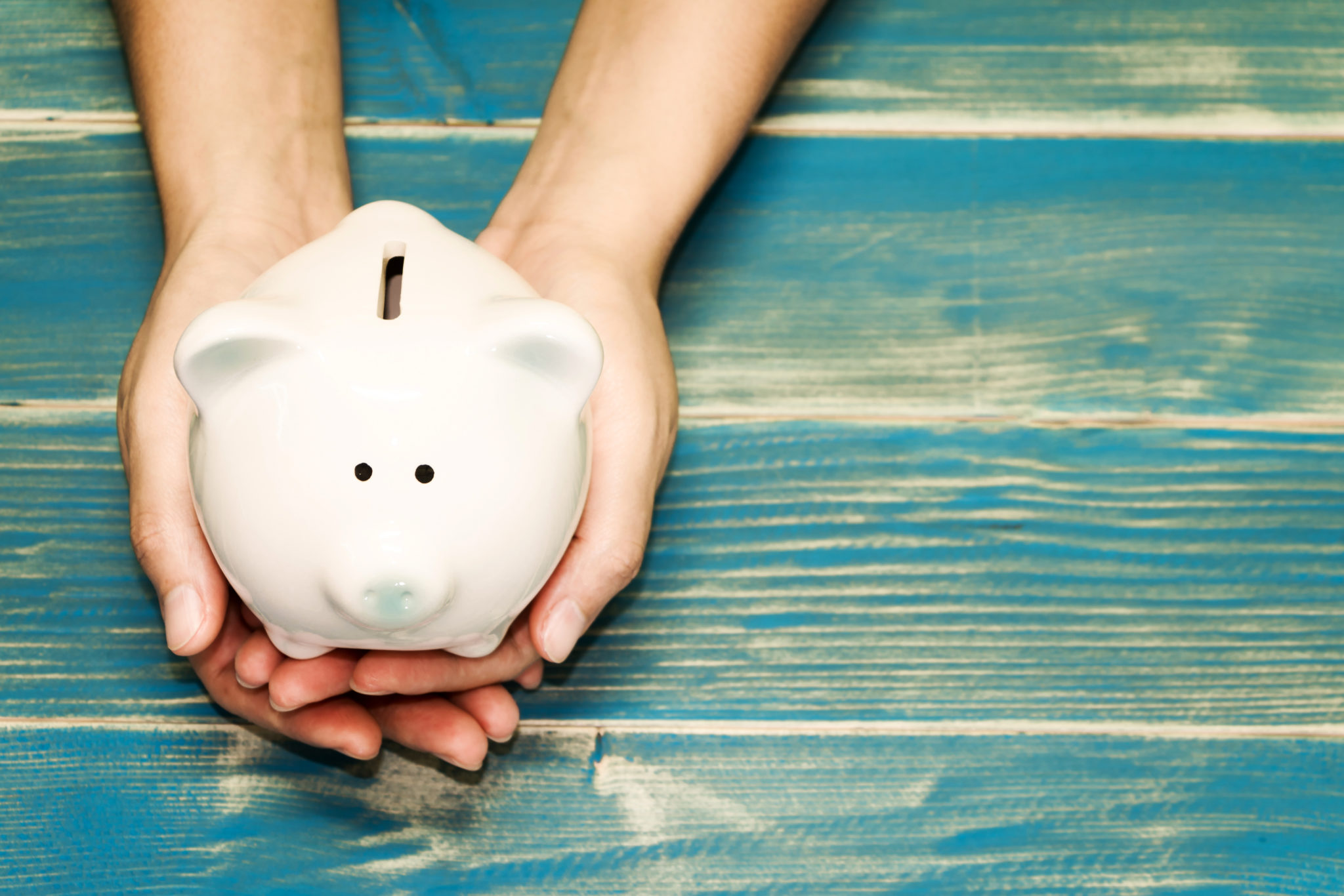affordable piggy bank in hands