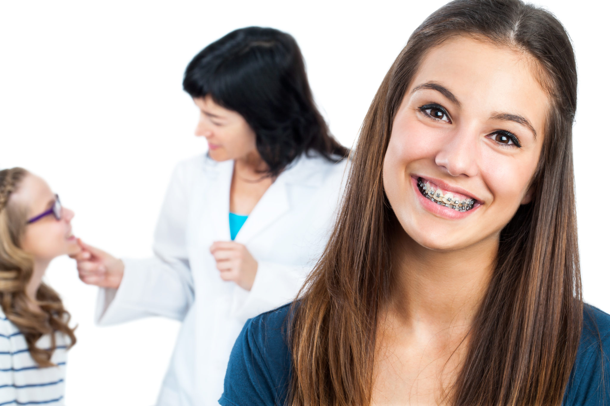 braces teenager at orthodontist